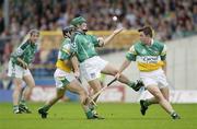 17 July 2003; Donnacha Sheehan, Limerick, in action against Offaly's David Franks, left, and Colm Casidy. Guinness All-Ireland Hurling Championship Qualifier, Round 3, Limerick v Offaly, Semple Stadium, Thurles, Co. Tipperary. Picture credit; Brendan Moran / SPORTSFILE *EDI*