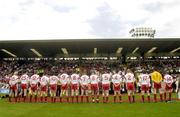 13 July 2003; The Tyrone team stand together before meeting President Mary McAleese. Bank of Ireland Ulster Senior Football Final, Tyrone v Down, St. Tighernach's Park, Clones, Co Monaghan. Picture credit; David Maher / SPORTSFILE *EDI*