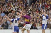19 July 2003; Tony Browne, 8, and Ken McGrath, Waterford, in action against Wexford's Darren Stamp. Guinness Senior Hurling Championship qualifier, Wexford v Waterford, Nowlan Park, Kilkenny. Picture credit; Matt Browne / SPORTSFILE *EDI*