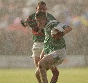 19 July 2003; Ciaran O'Reilly, Fermanagh, in action against Mayo's Kenneth Mortimer. Bank of Ireland Senior Football Championship qualifier, Mayo v Fermanagh, Markievicz Park, Sligo. Picture credit; Damien Eagers / SPORTSFILE *EDI*