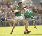 19 July 2003; Trevor Mortimer, Mayo, in action against Fermanagh's Paul Brewster. Bank of Ireland Senior Football Championship qualifier, Mayo v Fermanagh, Markievicz Park, Sligo. Picture credit; Damien Eagers / SPORTSFILE *EDI*