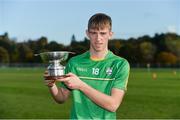 21 October 2017; Jack Sheridan of Ireland with the cup after the U21 Shinty International match between Ireland and Scotland at Bught Park in Inverness, Scotland. Photo by Piaras Ó Mídheach/Sportsfile