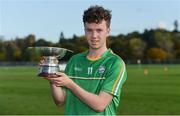 21 October 2017; Eoin O'Hehir of Ireland with the cup after the U21 Shinty International match between Ireland and Scotland at Bught Park in Inverness, Scotland. Photo by Piaras Ó Mídheach/Sportsfile