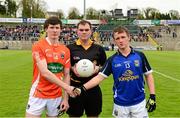 19 May 2013; The Armagh captain, Joseph McElroy, and the Cavan captain, Tom Hayes, shake hands across referee Maurice Deegan before the game. Electric Ireland Ulster GAA Football Minor Championship, First Round, Cavan v Armagh, Kingspan Breffni Park, Cavan. Picture credit: Ray McManus / SPORTSFILE