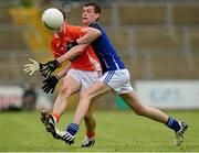 19 May 2013; Conor Martin, Armagh, in action against Donal Monahan, Cavan. Electric Ireland Ulster GAA Football Minor Championship, First Round, Cavan v Armagh, Kingspan Breffni Park, Cavan. Picture credit: Ray McManus / SPORTSFILE