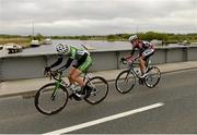 20 May 2013; Ronan McLaughlin, An Post Chain Reaction, left, left, and Rico Rogers, Synergy Baku cross the River Shannon in Portumna during Stage 2 of the 2013 An Post Rás. Longford - Nenagh. Photo by Sportsfile