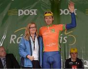 20 May 2013; Madeline McGovern, Director of Corporate and Strategic Development LeasePlan, presents the Stage Leader jersey to Marcin Bialoblocki, Britain UK Youth Pro Cycling after Stage 2 of the 2013 An Post Rás. Longford - Nenagh. Photo by Sportsfile