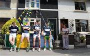 21 May 2013; A selection of Ulster Bank’s GAA stars, from left, Fermanagh's Tommy McElroy, Kerry's Kieran Donaghy, Galway's Finian Hanley and Donegal's Karl Lacey, pictured with local resident Carmel Buckley who took a break from her painting, gathered at a home outside Croke Park today to mark Ulster Bank’s sixth year as official sponsor of the GAA Football All-Ireland Senior Championship. As part of Ulster Bank’s sponsorship, their GAA stars were on-hand to launch the ‘Ulster Bank Best GAA Home’ campaign, a nationwide search to find the best ‘GAA Home’ on the island of Ireland. Throughout the Championship, Ulster Bank is asking supporters to Tweet, post on Facebook and email pictures of how they have decorated their houses, clubs and communities, with their beloved county colours. One overall winner will be selected to win €5,000 towards a home-makeover, as well as tickets and accommodation, for their family, to the GAA Football All-Ireland Final in Croke Park. Additional prizes will be given out regularly throughout the campaign. Ulster Bank GAA Launch, Clonliffe Avenue, Dublin. Picture credit: Brian Lawless / SPORTSFILE