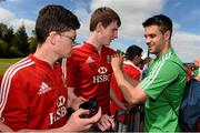21 May 2013; Conor Murray, British & Irish Lions, signs autographs for spectators after squad training ahead of the British & Irish Lions Tour 2013. British & Irish Lions Tour 2013 Squad Training, Carton House, Maynooth, Co. Kildare. Picture credit: David Maher / SPORTSFILE