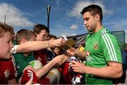 21 May 2013; Conor Murray, British & Irish Lions, signs autographs for spectators at the end of squad training ahead of the British & Irish Lions Tour 2013. British & Irish Lions Tour 2013 Squad Training, Carton House, Maynooth, Co. Kildare. Picture credit: David Maher / SPORTSFILE