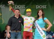21 May 2013; Terry Spence, Advertising and Promotions Manager One4All, and Miss An Post Rás Eibhlis Moriarty present Martin Hunal, AC Sparta Praha, with the One4All King of the Mountains after Stage 3 of the 2013 An Post Rás between Nenagh and Listowel. Listowel, Co. Kerry. Photo by Sportsfile