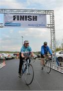 17 May 2013; Cyclists Wendy Nesbitt, left, and David Mathews, from Northern Ireland, cross the finish line during the National Make-A-Wish Bank of Ireland cycle. National Make-A-Wish Bank of Ireland Cycle, Hodson Bay Hotel, Athlone, Co. Westmeath. Picture credit: Diarmuid Greene / SPORTSFILE