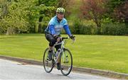 17 May 2013; Cyclist Jim Garvey, having cycled from Lucan, Co. Dublin, cross the finish line during the National Make-A-Wish Bank of Ireland cycle. National Make-A-Wish Bank of Ireland Cycle, Hodson Bay Hotel, Athlone, Co. Westmeath. Picture credit: Diarmuid Greene / SPORTSFILE