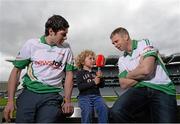 22 May 2013; Pictured at the launch of Newstalk 106-108 fm's coverage schedule of the 2013 GAA All-Ireland Senior Championships Felix Fitzgerald, age 3, from Aughrim, Co. Wicklow, interviewing Tyrone's Sean Cavanagh, left, and Kerry's Tomás Ó Sé. Newstalk sport-veterans, Ger Gilroy and Dave McIntyre, revealed an all-star panel that will join the Newstalk sports team in delivering the best GAA coverage and analysis available on national radio – for the second year running. Among those giving their expert commentary and analysis of the 2013 GAA Football All-Ireland Championship will be recently retired legend Dermot Earley, four time All Star Darragh Ó Sé, Kerry legend John Crowley and Mayo stars Liam McHale and David Brady, to name a few. Joining the team to give their views on the 2013 GAA Hurling All-Ireland Championship will be former Wexford hurler Diarmuid Lyng, Clare star Jamesie O'Connor, Cork's defensive rock Diarmuid O'Sullivan, and Offaly duo Daithí Regan and Johnny Pilkington. Croke Park, Dublin. Picture credit: Brian Lawless / SPORTSFILE