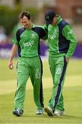23 May 2013; Alex Cusack, Ireland, left, is congratulated by Trent Johnston, after taking the wicket of Imran Farhat, Pakistan. RSA Insurance One Day International, Ireland v Pakistan, Clontarf Cricket Club, Castle Avenue, Clontarf, Dublin. Picture credit: Oliver McVeigh / SPORTSFILE