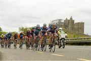 24 May 2013; The peleton passes by the Rock of Cashel, Co. Tipperary, during Stage 6 of the 2013 An Post Rás. Mitchelstown – Carlow. Photo by Sportsfile