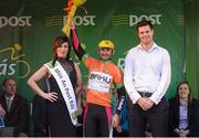 24 May 2013; Stage winner Rico Rogers, Synergy Baku, with Miss An Post Rás Cora Brennan and John Trevor McVeagh, Corporate Sales manager, after stage 6 of the 2013 An Post Rás. Mitchelstown – Carlow. Photo by Sportsfile