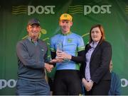 24 May 2013; Bryan McCrystal, Louth Prague Charter Team, is presented with the county riders jersey by John Walsh and Sinead Butler, Customer Sales Advisor, after stage 6 of the 2013 An Post Rás. Mitchelstown – Carlow. Photo by Sportsfile