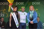 24 May 2013; Simon Yates, Great Britain National team, is presented with the Irish Sports Council Under 23's leaders jersey by Miss An Post Rás Cora Brennan, left, and Sandra Corrigan, Carlow Sports Partnership, after stage 6 of the 2013 An Post Rás. Mitchelstown – Carlow. Photo by Sportsfile