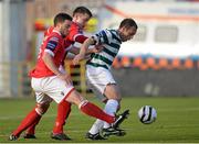 24 May 2013; Stephen Rice, Shamrock Rovers, in action against Graham Gartland, left, and Robert Cornwall, Shelbourne. Airtricity League Premier Division, Shamrock Rovers v Shelbourne, Tallaght Stadium, Tallaght, Co. Dublin. Picture credit: Brian Lawless / SPORTSFILE