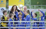 25 May 2013; Aaron Lynch, St. Michael's NS, Trim Co. Meath, lifts the cup after winning Group C. Aviva Health FAI Primary School 5's, National Finals, Aviva Stadium, Lansdowne Road, Dublin. Picture credit: Pat Murphy / SPORTSFILE