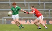 25 May 2013; Francis O'Riordan, Limerick, in action against Eoin O'Mahony, Cork. Munster GAA Football Junior Championship, Quarter-Final, Limerick v Cork, Gaelic Grounds, Limerick. Picture credit: Diarmuid Greene / SPORTSFILE