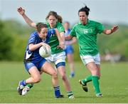 25 May 2013; Geraldine O'Flynnl, Munster, in action against Noelle Healy, centre, and Katie O'Brien, right, Leinster. 2013 MMI Group Ladies Football Interprovincial Tournament, Shield Final, Leinster v Munster, Kinnegad, Co. Westmeath. Picture credit: Barry Cregg / SPORTSFILE