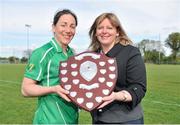 25 May 2013; Denise Masterson, Leinster, is presented with the shield trophy from Marie Hickey, Ladies Gaelic Football Association after the game. 2013 MMI Group Ladies Football Interprovincial Tournament, Shield Final, Leinster v Munster, Kinnegad, Co. Westmeath. Picture credit: Barry Cregg / SPORTSFILE