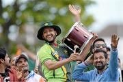 26 May 2013; Pakistan supporters celebrate during Ireland's innings. RSA Insurance One Day International, Ireland v Pakistan, Clontarf Cricket Club, Castle Avenue, Clontarf, Dublin. Picture credit: Brian Lawless / SPORTSFILE