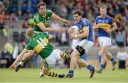 26 May 2013; Ciaran McDonald, Tipperary, in action against Colm Cooper and Anthony Maher, Kerry. Munster GAA Football Senior Championship, Quarter-Final, Kerry v Tipperary, Fitzgerald Stadium, Killarney, Co. Kerry. Picture credit: Diarmuid Greene / SPORTSFILE