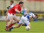 26 May 2013; Padraig McMahon, Laois, in action against Derek Maguire, Louth. Leinster GAA Football Senior Championship, First Round, Laois v Louth, O'Moore Park, Portlaoise, Co. Laois. Picture credit: Dáire Brennan / SPORTSFILE