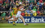 26 May 2013; Joe McMahon, Tyrone, in action against Frank McGlynn, Donegal. Ulster GAA Football Senior Championship, Quarter-Final, Donegal v Tyrone, MacCumhaill Park, Ballybofey, Co. Donegal. Picture credit: Oliver McVeigh / SPORTSFILE