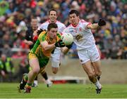 26 May 2013; Patrick McBrearty, Donegal, in action against PJ Quinn, Tyrone. Ulster GAA Football Senior Championship, Quarter-Final, Donegal v Tyrone, MacCumhaill Park, Ballybofey, Co. Donegal. Picture credit: Ray McManus / SPORTSFILE