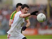 26 May 2013; Matthew Donnelly, Tyrone, in action against David Walsh, Donegal. Ulster GAA Football Senior Championship, Quarter-Final, Donegal v Tyrone, MacCumhaill Park, Ballybofey, Co. Donegal. Picture credit: Oliver McVeigh / SPORTSFILE