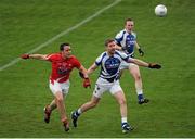 26 May 2013; Denis Booth, Laois, in action against Shane Lennon, Louth. Leinster GAA Football Senior Championship, First Round, Laois v Louth, O'Moore Park, Portlaoise, Co. Laois. Picture credit: Dáire Brennan / SPORTSFILE