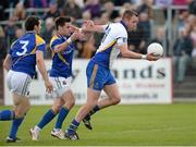 26 May 2013; James Stafford, Wicklow, in action against Shane Mulligan and Barry Gilleran, left, Longford. Leinster GAA Football Senior Championship, First Round, Wicklow v Longford, County Grounds, Aughrim, Co. Wicklow. Picture credit: Matt Browne / SPORTSFILE