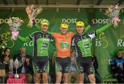 26 May 2013; An Post Chain Reaction cyclists, from left, Nicholas Vereecken, Sam Bennett and Shane Archbold celebrate on stage at Skerries after finishing 2nd, 1st, and 3rd respectively in Stage 8 of the 2013 An Post Rás. Naas - Skerries. Photo by Sportsfile
