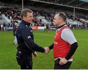 26 May 2013; Laois manager Justin McNulty congratulates his former Armagh team-mate and Louth manager Aidan O'Rourke, after the game. Leinster GAA Football Senior Championship, First Round, Laois v Louth, O'Moore Park, Portlaoise, Co. Laois. Picture credit: Dáire Brennan / SPORTSFILE