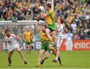 26 May 2013; Ross Wherity and Paddy McGrath, Donegal, in action against Peter Harte, Tyrone supported by Joe McMahon. Ulster GAA Football Senior Championship, Quarter-Final, Donegal v Tyrone, MacCumhaill Park, Ballybofey, Co. Donegal. Picture credit: Oliver McVeigh / SPORTSFILE