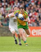 26 May 2013; Michael Murphy, Donegal, in action against Martin Penrose, Tyrone. Ulster GAA Football Senior Championship, Quarter-Final, Donegal v Tyrone, MacCumhaill Park, Ballybofey, Co. Donegal. Picture credit: Oliver McVeigh / SPORTSFILE