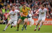 26 May 2013; Michael Murphy, Donegal, in action against Martin Penrose, left, and Dermot Carlin, Tyrone. Ulster GAA Football Senior Championship, Quarter-Final, Donegal v Tyrone, MacCumhaill Park, Ballybofey, Co. Donegal. Picture credit: Oliver McVeigh / SPORTSFILE