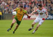 26 May 2013; Michael Murphy, Donegal, in action against Conor Clarke, Tyrone. Ulster GAA Football Senior Championship, Quarter-Final, Donegal v Tyrone, MacCumhaill Park, Ballybofey, Co. Donegal. Picture credit: Oliver McVeigh / SPORTSFILE