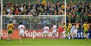 26 May 2013; Ross Wherity palmed effort beats Tyrone goalkeeper Niall Morgan for Donegal's second goal. Ulster GAA Football Senior Championship, Quarter-Final, Donegal v Tyrone, MacCumhaill Park, Ballybofey, Co. Donegal. Picture credit: Ray McManus / SPORTSFILE