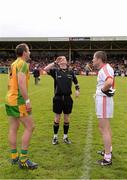 26 May 2013; The Donegal captain Michael Murphy, left, and Tyrone captain Stephen O'Neill look on as referee Joe McQuillan tosses a coin, to decide ends, before the game. Ulster GAA Football Senior Championship, Quarter-Final, Donegal v Tyrone, MacCumhaill Park, Ballybofey, Co. Donegal. Picture credit: Ray McManus / SPORTSFILE