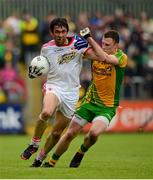 26 May 2013; Joe McMahon, Tyrone, in action against Martin McElhinney, Donegal. Ulster GAA Football Senior Championship, Quarter-Final, Donegal v Tyrone, MacCumhaill Park, Ballybofey, Co. Donegal. Picture credit: Ray McManus / SPORTSFILE
