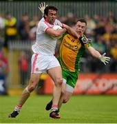 26 May 2013; Joe McMahon, Tyrone, in action against Martin McElhinney, Donegal. Ulster GAA Football Senior Championship, Quarter-Final, Donegal v Tyrone, MacCumhaill Park, Ballybofey, Co. Donegal. Picture credit: Ray McManus / SPORTSFILE