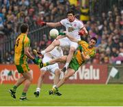26 May 2013; Sean Cavanagh, Tyrone, in action against Rory Kavanagh, Donegal. Ulster GAA Football Senior Championship, Quarter-Final, Donegal v Tyrone, MacCumhaill Park, Ballybofey, Co. Donegal. Picture credit: Oliver McVeigh / SPORTSFILE