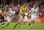 26 May 2013; Michael Murphy, Donegal, in action against Martin Penrose and Dermot Carlin, Tyrone. Ulster GAA Football Senior Championship, Quarter-Final, Donegal v Tyrone, MacCumhaill Park, Ballybofey, Co. Donegal. Picture credit: Oliver McVeigh / SPORTSFILE