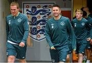 28 May 2013; Republic of Ireland captain Robbie Keane, centre, alongside team-mates Richard Dunne, left, and James McClean make their way out for the start of squad training ahead of their International Friendly against England on Wednesday. Republic of Ireland Squad Training, Wembley Stadium, London, England. Picture credit: David Maher / SPORTSFILE