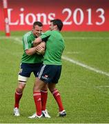 29 May 2013; Tommy Bowe, left, and Mike Phillips, British & Irish Lions, during squad training ahead of their game against Barbarian FC on Saturday. British & Irish Lions Tour 2013, Squad Training, Aberdeen Sports Ground, Hong Kong, China. Picture credit: Stephen McCarthy / SPORTSFILE